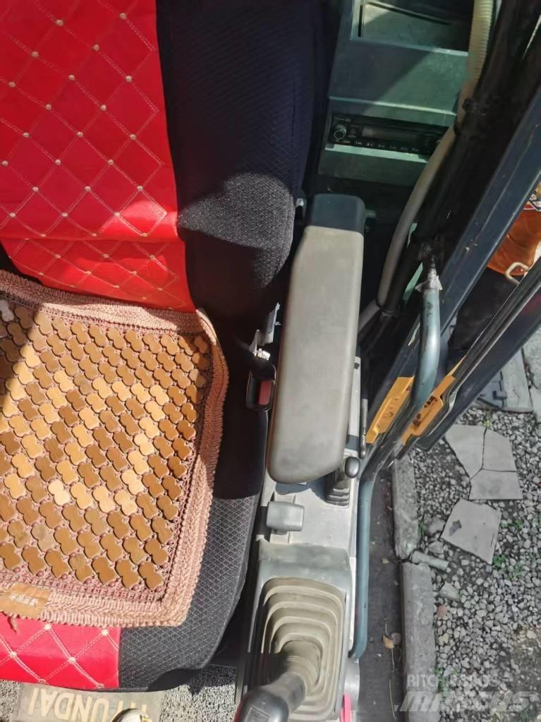 Hyundai 210w-9 Колесни екскаватори