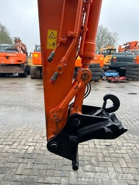 Hitachi ZX140W-5B Колесни екскаватори