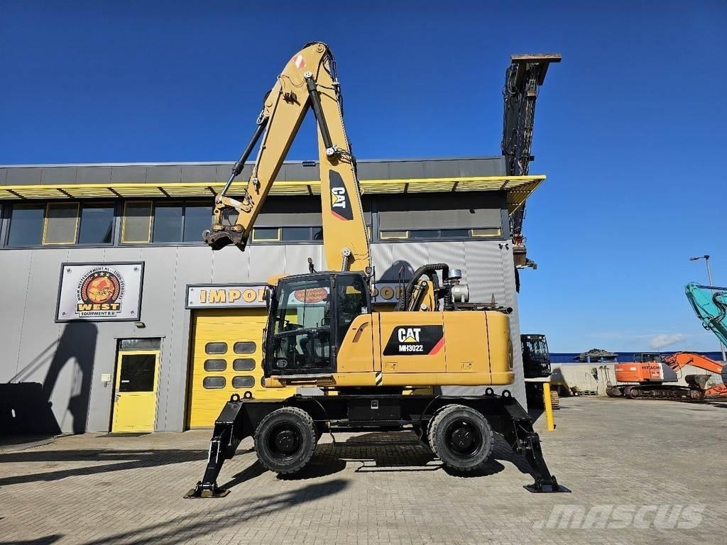 CAT MH 3022 Колесни екскаватори