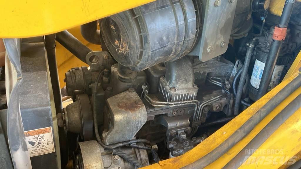 New Holland B 95 B Товарач със заден ексватор
