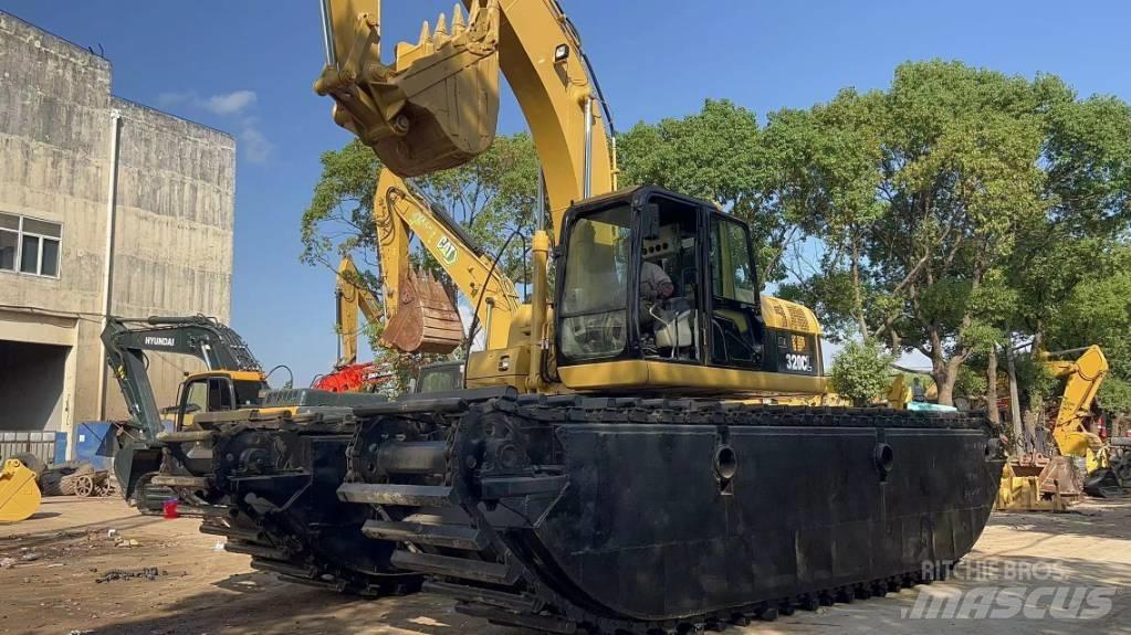 CAT 320 C Багери амфибии