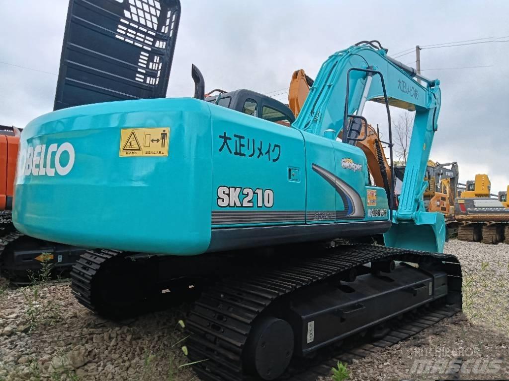 Kobelco SK 210 Средни екскаватори 7т - 12т