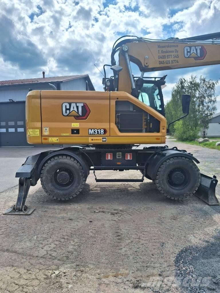 CAT M 318 Колесни екскаватори