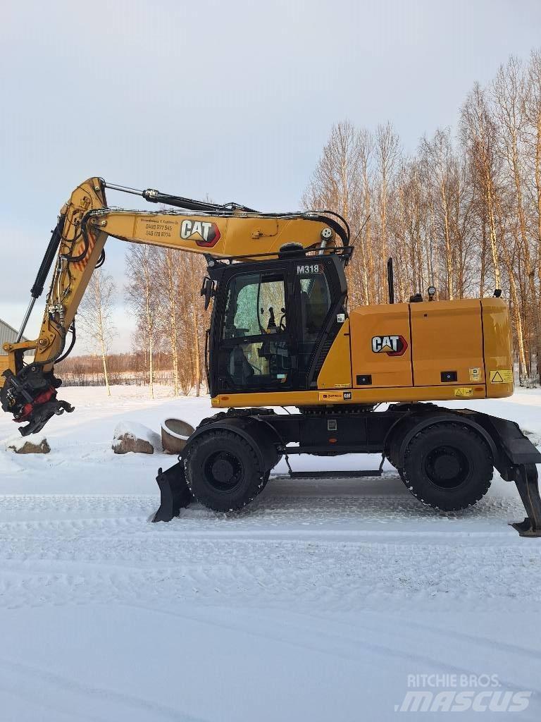 CAT M 318 Колесни екскаватори