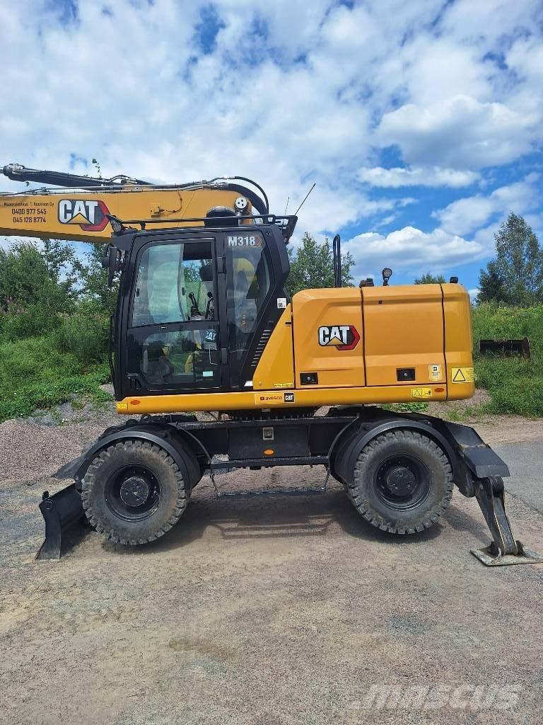 CAT M 318 Колесни екскаватори