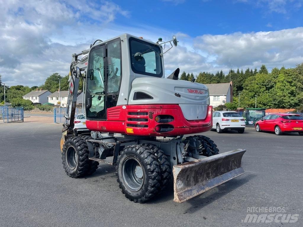 Takeuchi TB295W Колесни екскаватори
