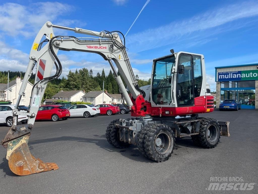 Takeuchi TB295W Колесни екскаватори