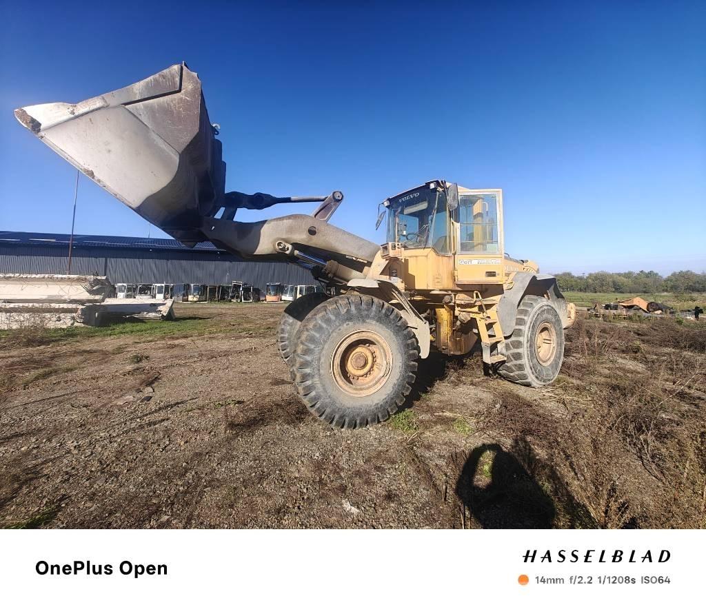 Volvo L 120 E Стрели и рамена

