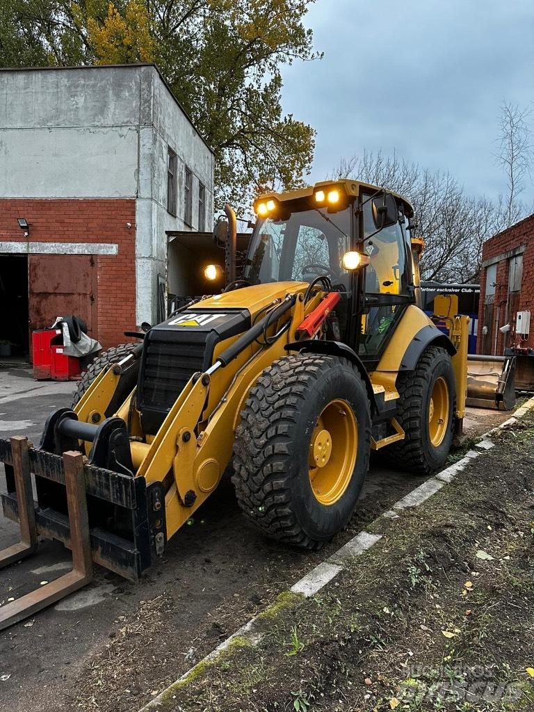 CAT 444F Товарач със заден ексватор