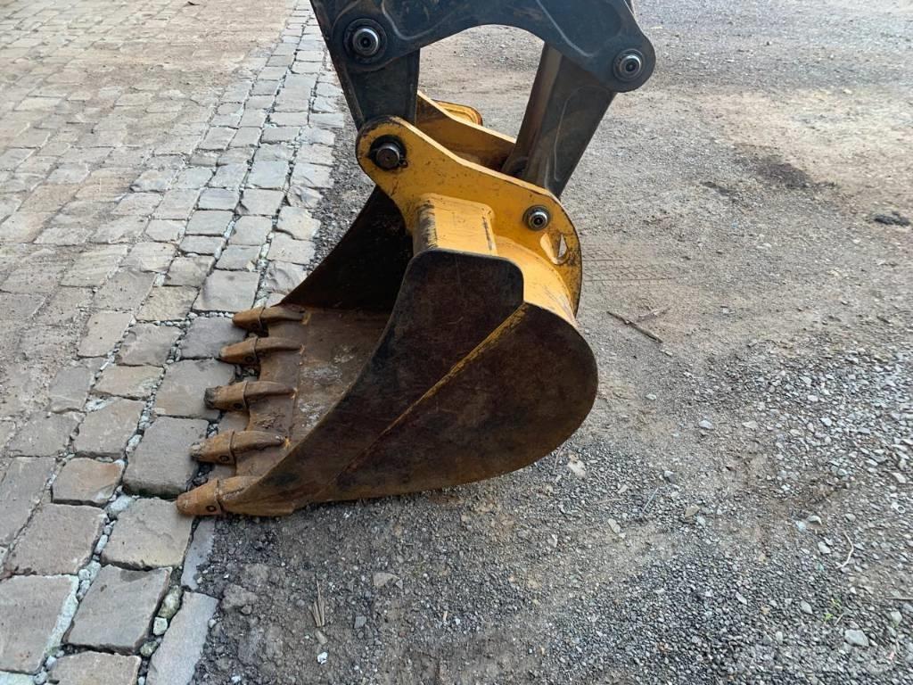 John Deere 310 L Товарач със заден ексватор