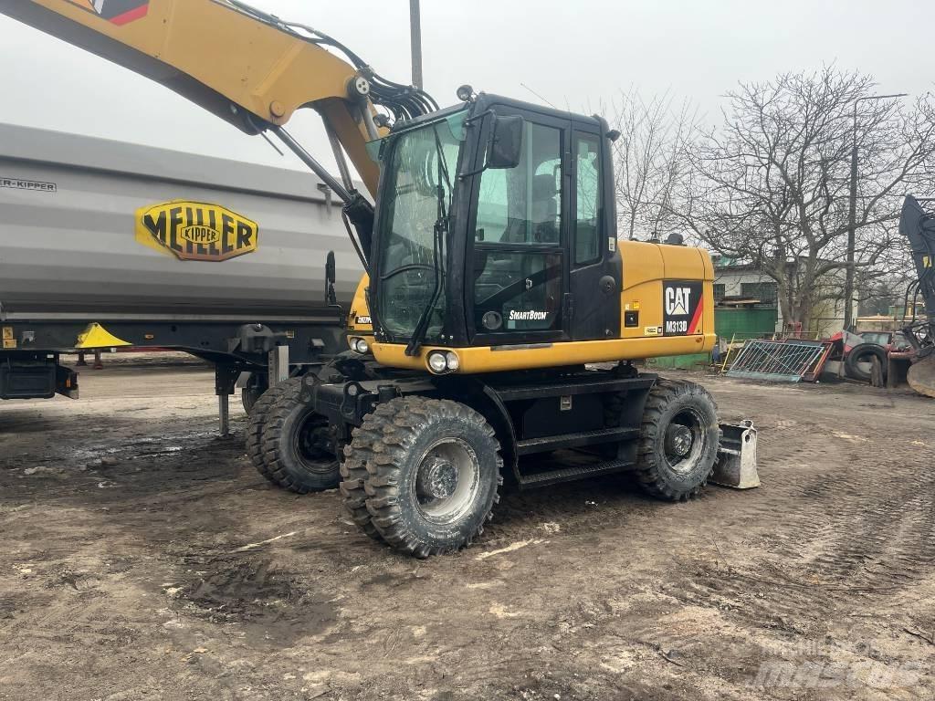 CAT 313 D Колесни екскаватори