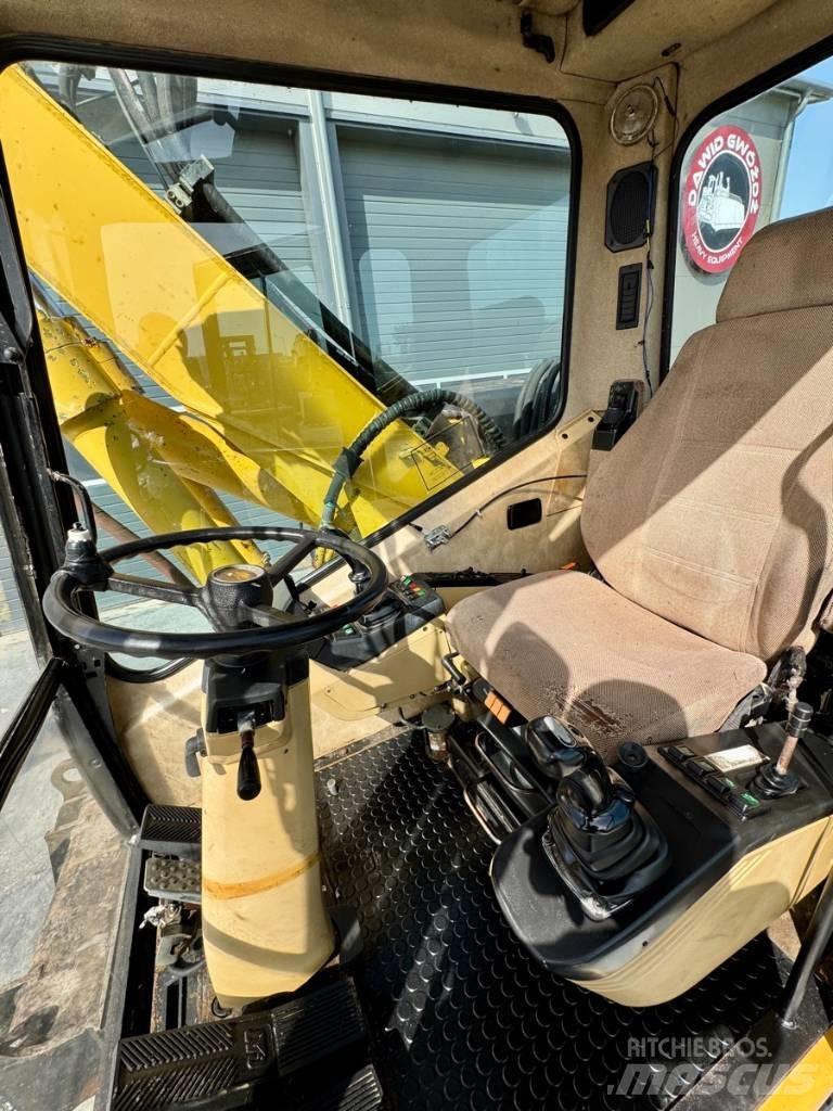 CAT M 312 Колесни екскаватори