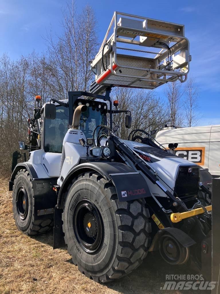 Huddig 1370 T Товарач със заден ексватор