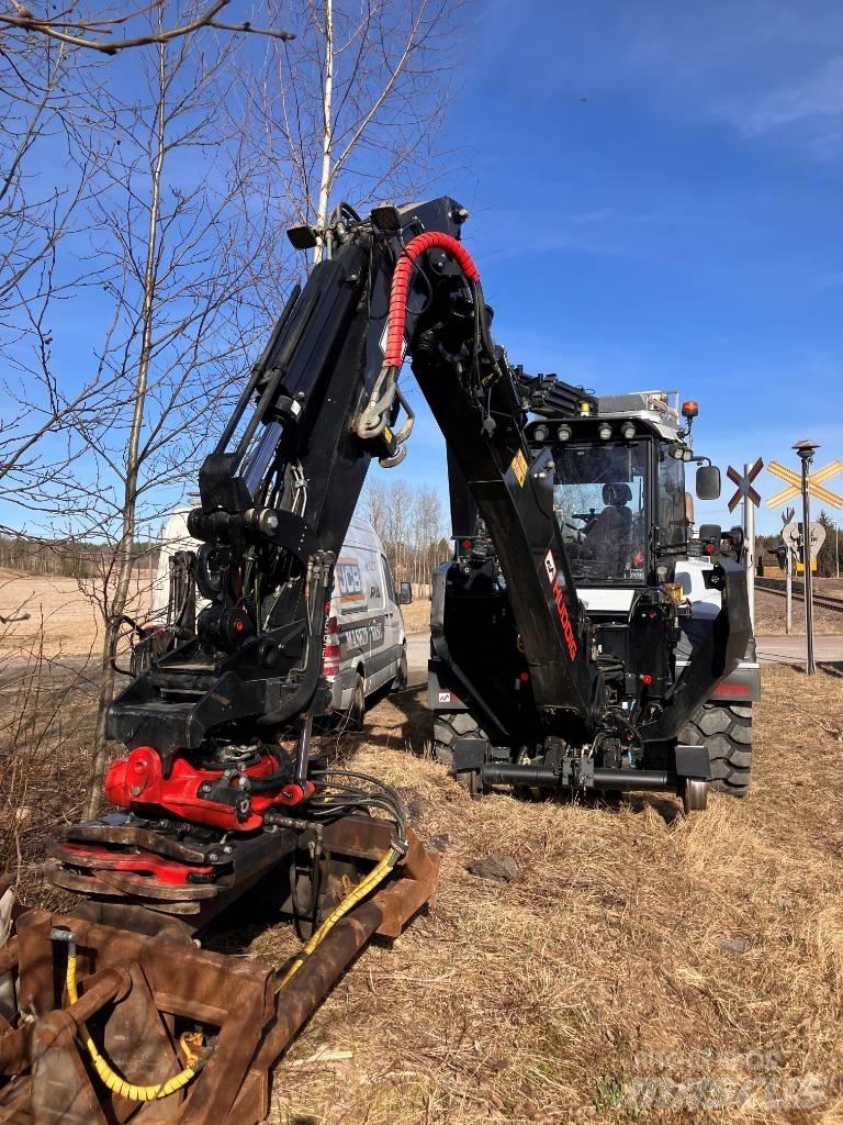 Huddig 1370 T Товарач със заден ексватор