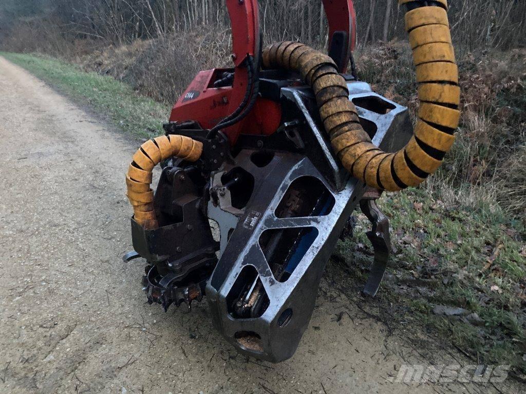 Komatsu C 144 Харвестери