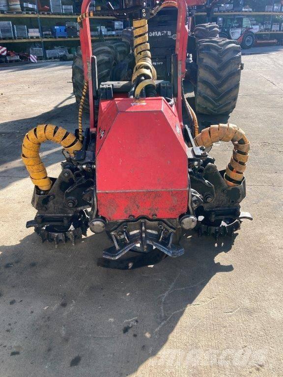 Komatsu C 144 Харвестери