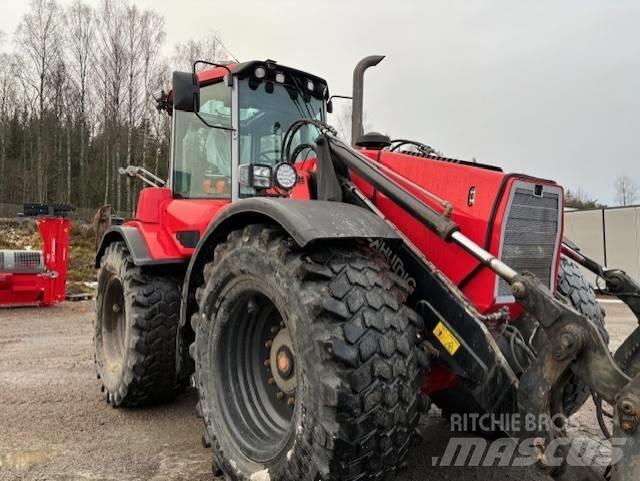 Huddig 1260 Товарач със заден ексватор
