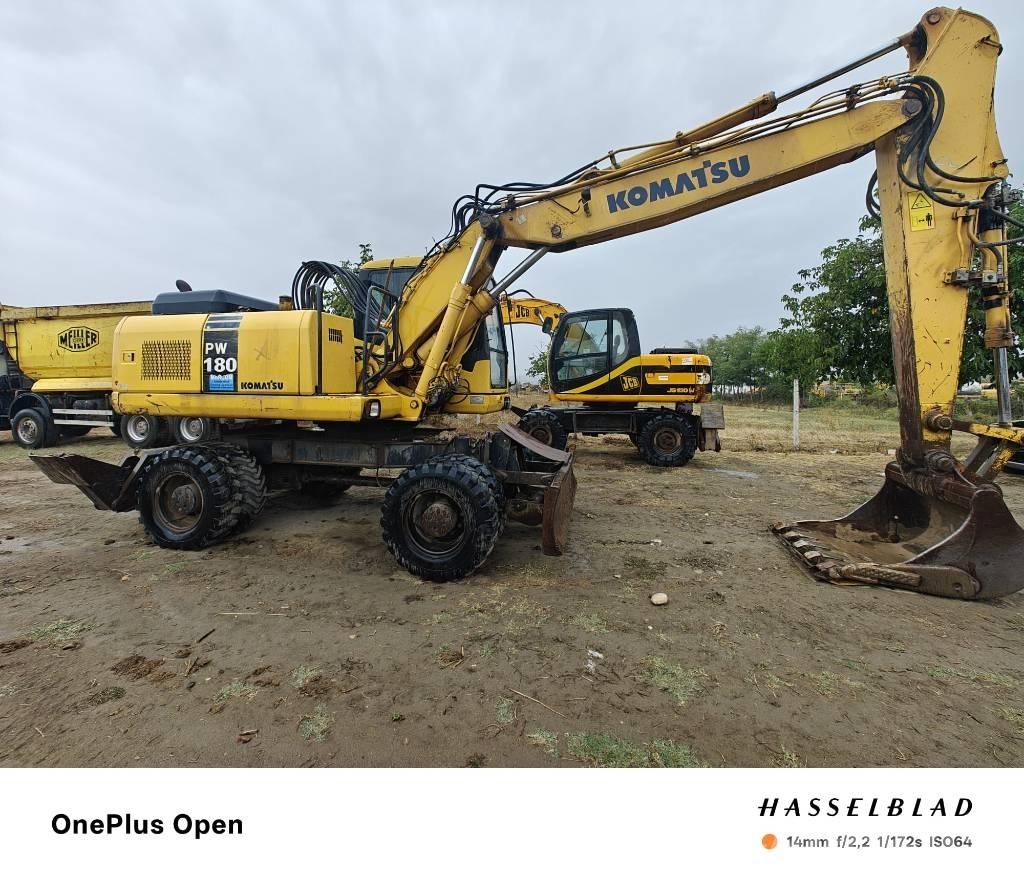 Komatsu PW 180 Оси

