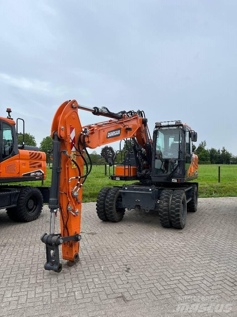 Develon DX140W-7 Колесни екскаватори