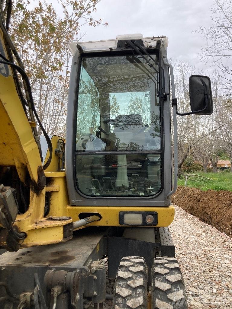 New Holland MH 2.6 Колесни екскаватори