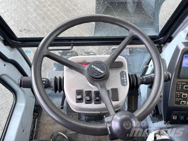 Hyundai Robex 140 W Колесни екскаватори