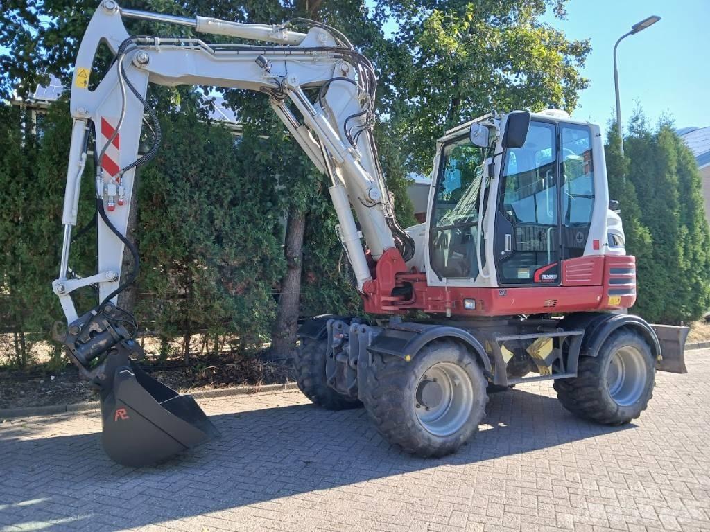 Takeuchi TB 295 W Колесни екскаватори