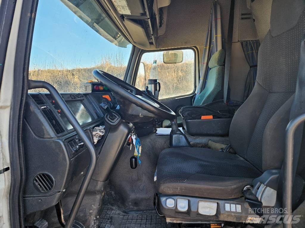 Volvo FM 12 Камиони за превоз на горски машини
