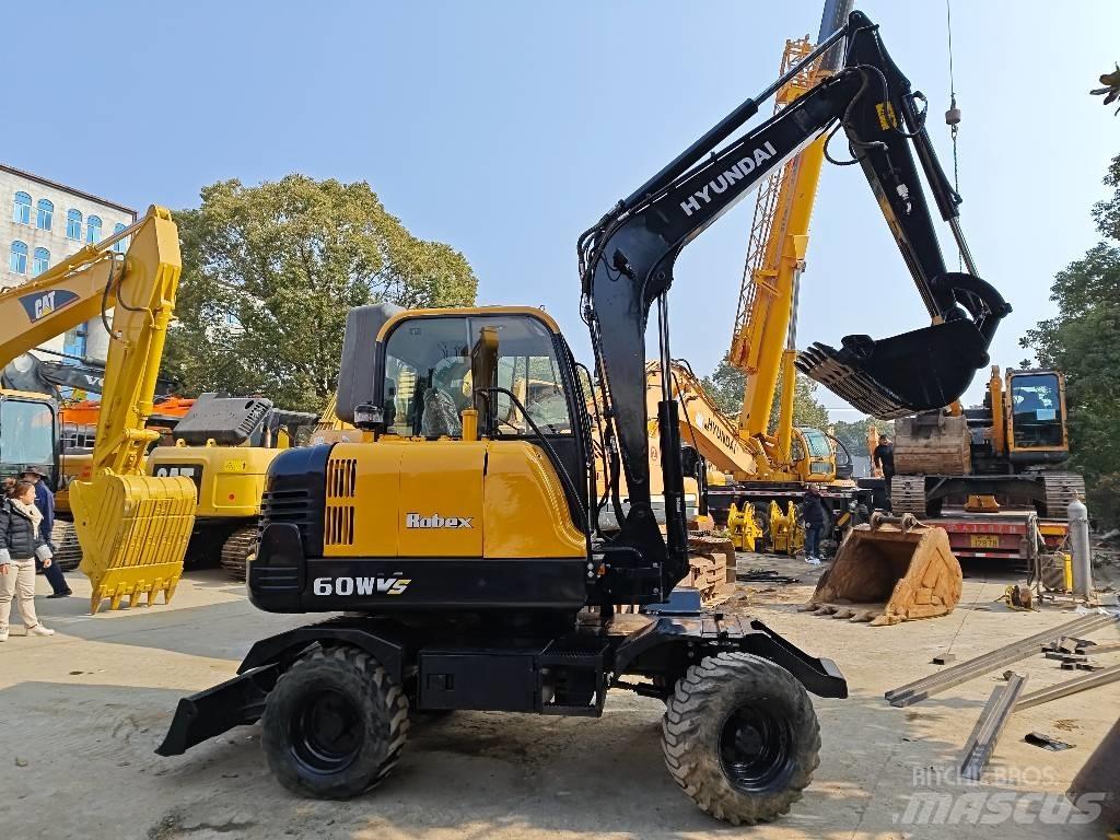 Hyundai 60W-9 Колесни екскаватори