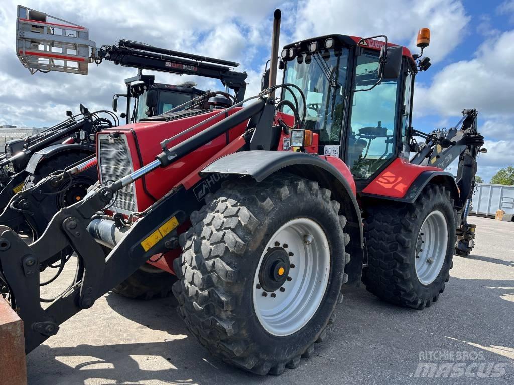 Huddig 1260 B Товарач със заден ексватор