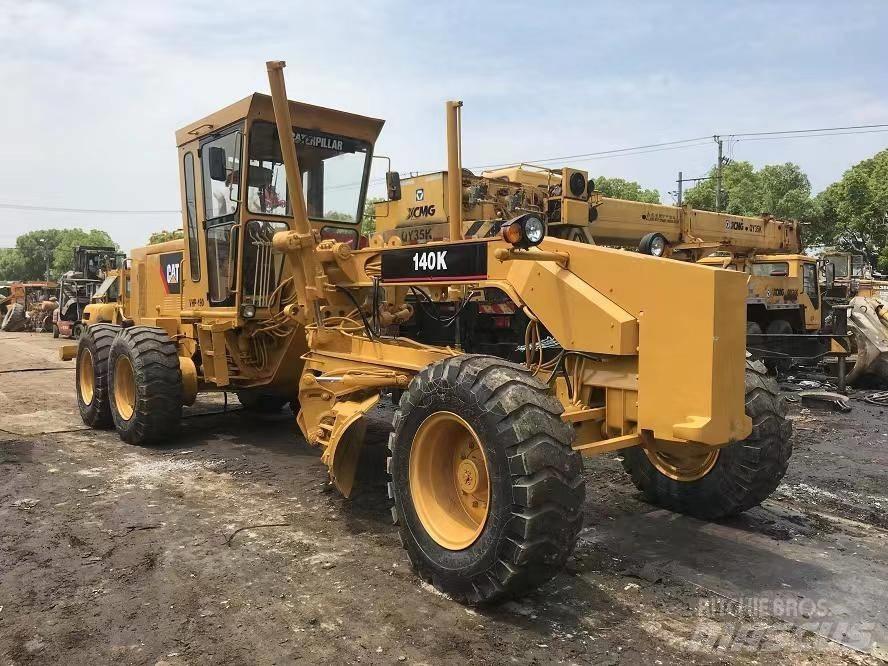 CAT 140 Грейдери