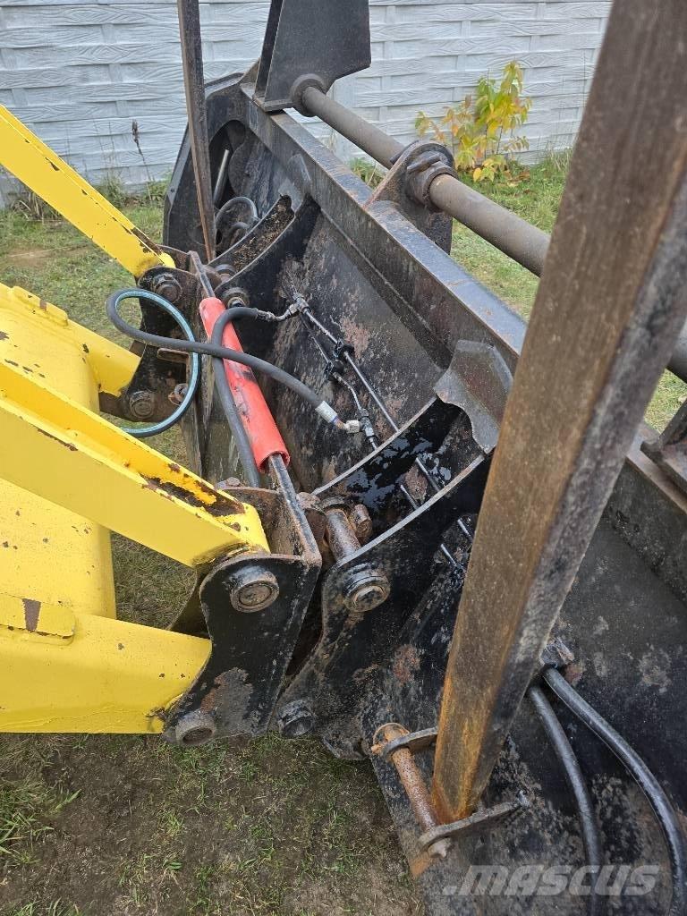 New Holland 115 Товарач със заден ексватор