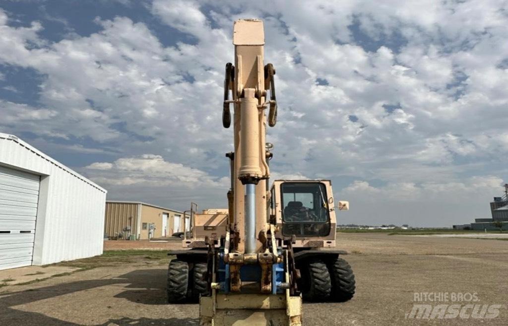 John Deere 595 Колесни екскаватори