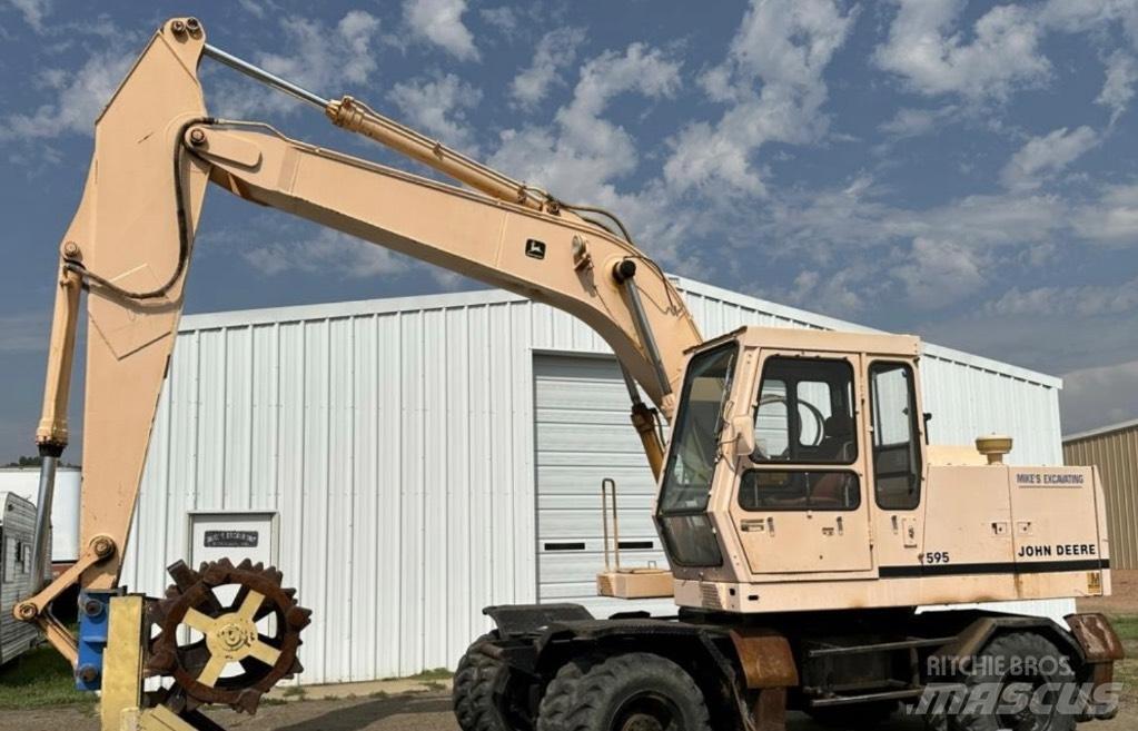 John Deere 595 Колесни екскаватори