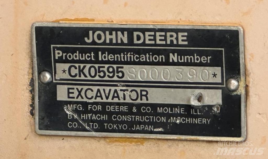 John Deere 595 Колесни екскаватори