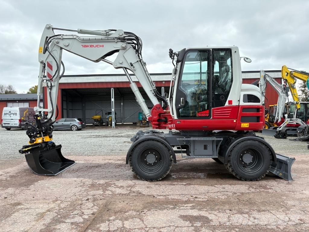Takeuchi TB395W Колесни екскаватори