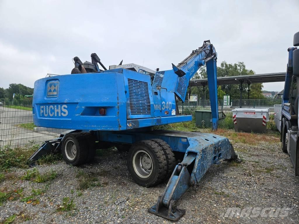 Fuchs MHL 340 Оператори на отпадъци/индустрия
