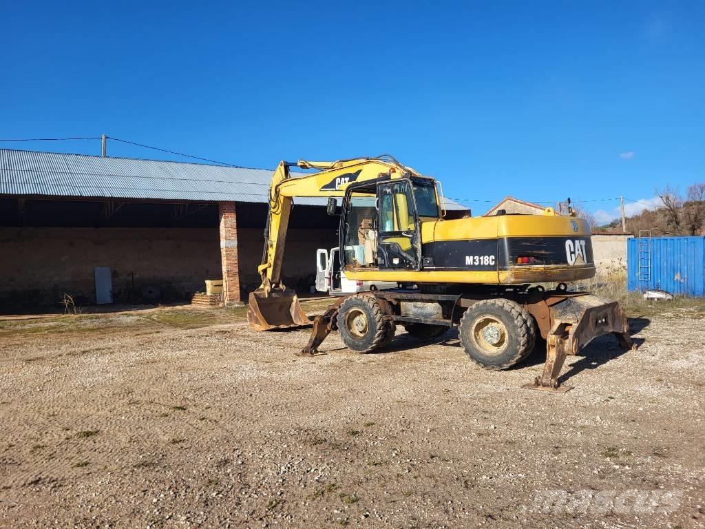 CAT M318c Колесни екскаватори