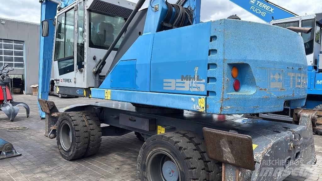 Fuchs MHL 335 E Оператори на отпадъци/индустрия
