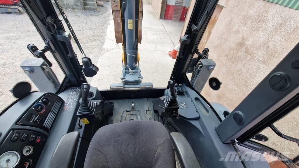 Terex TLB 890 Товарач със заден ексватор