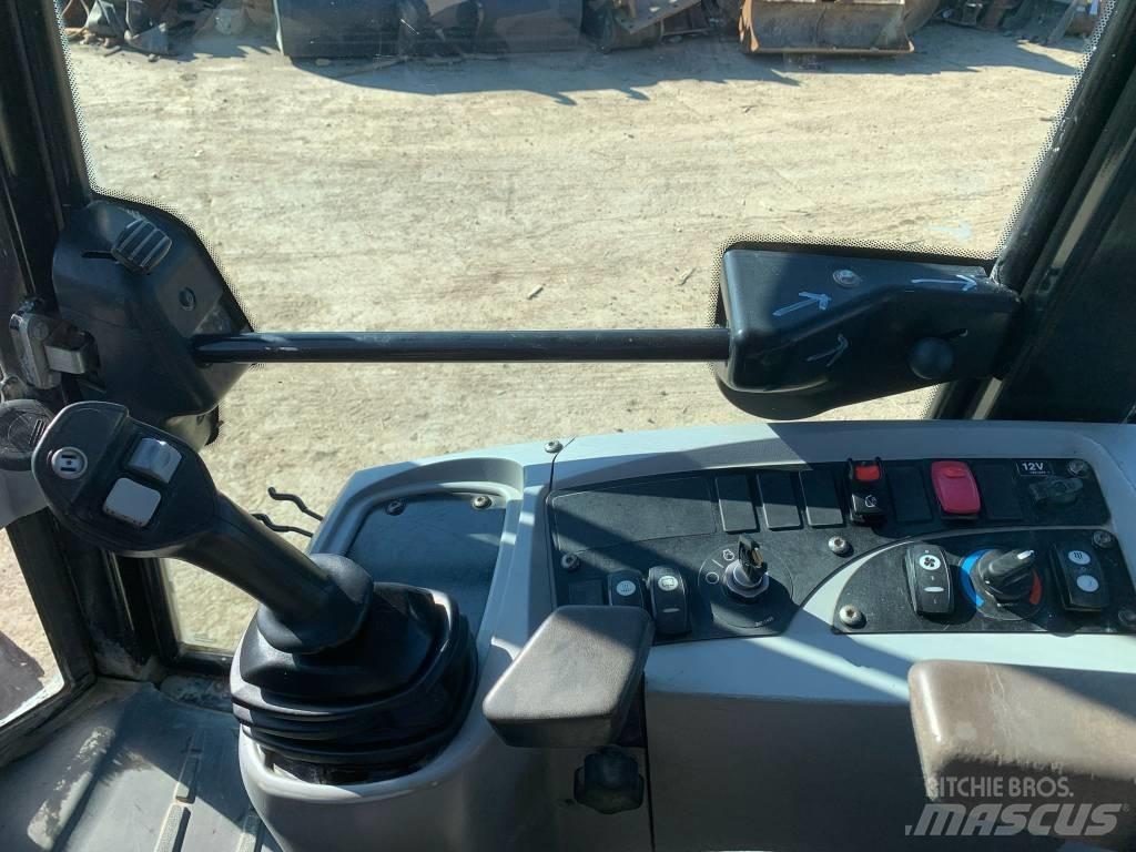 CAT 908H Колесни товарачи
