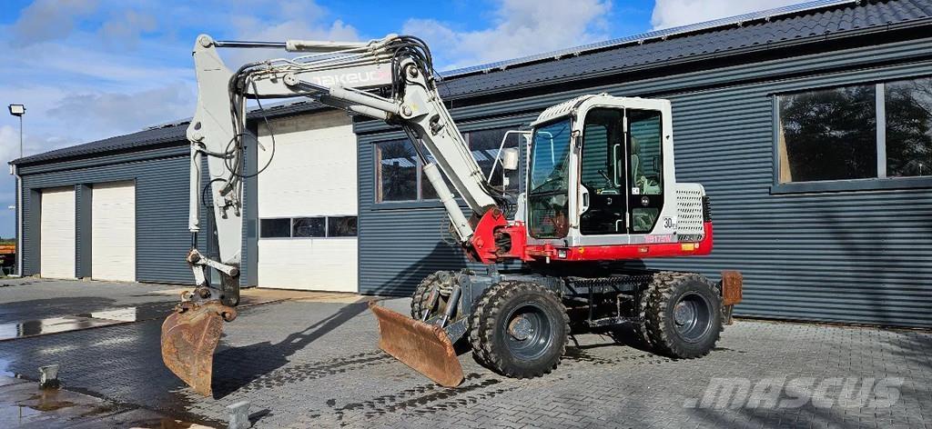 Takeuchi TB 175W Средни екскаватори 7т - 12т