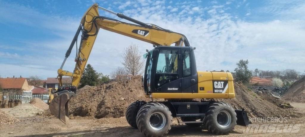 CAT M 313 D Колесни екскаватори
