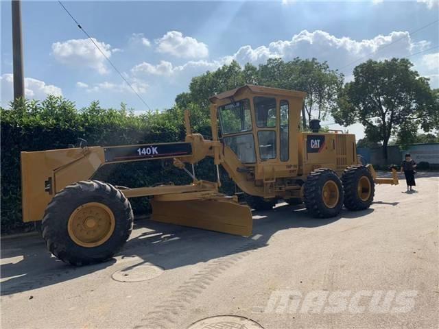 CAT 140K Грейдери