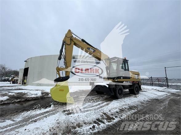 CAT M318D Колесни екскаватори