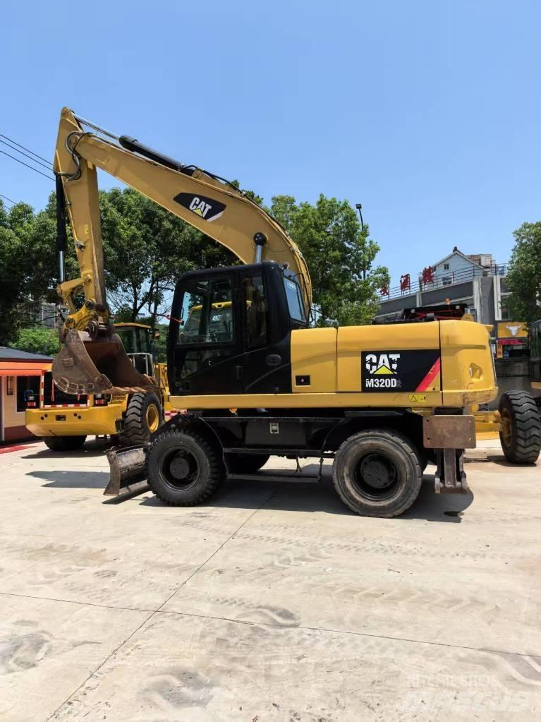CAT M 320 Колесни екскаватори