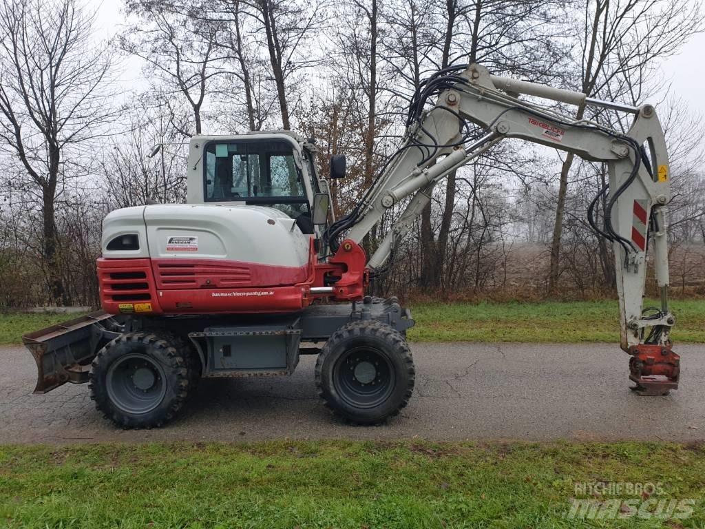 Takeuchi TB 295 W Колесни екскаватори