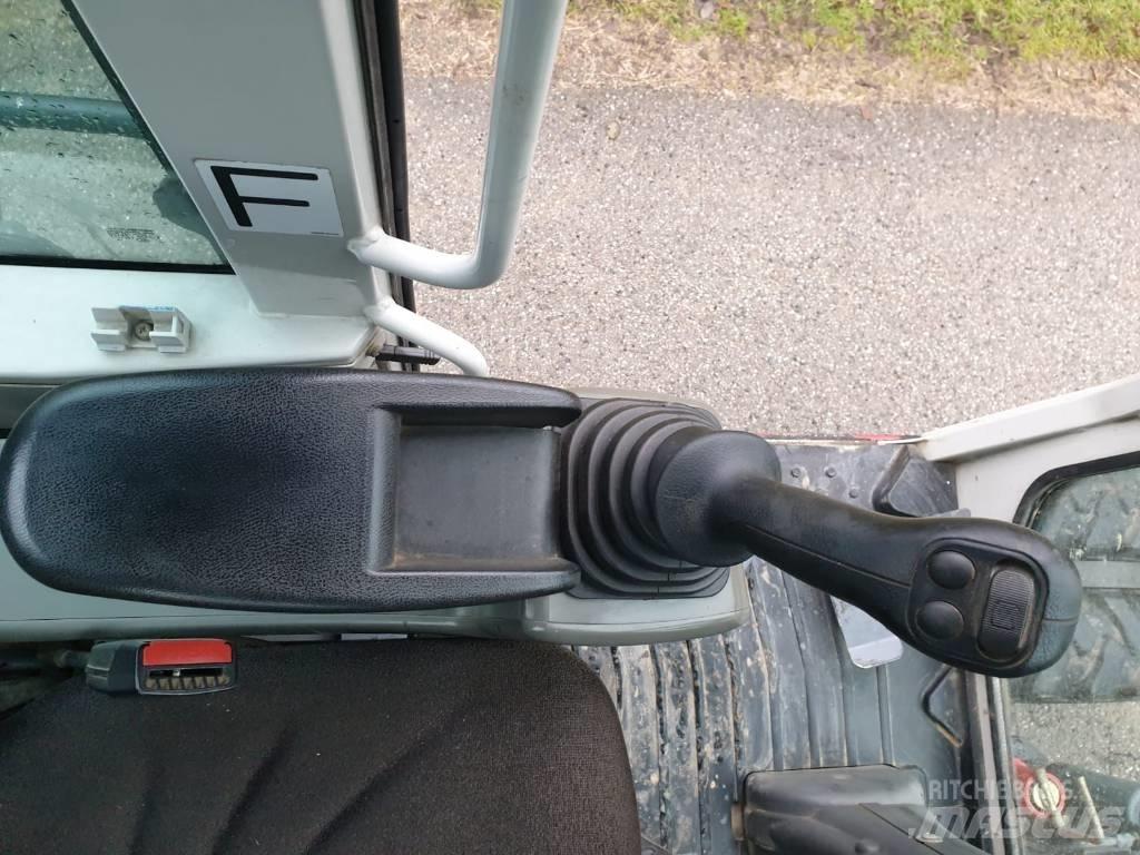 Takeuchi TB 295 W Колесни екскаватори
