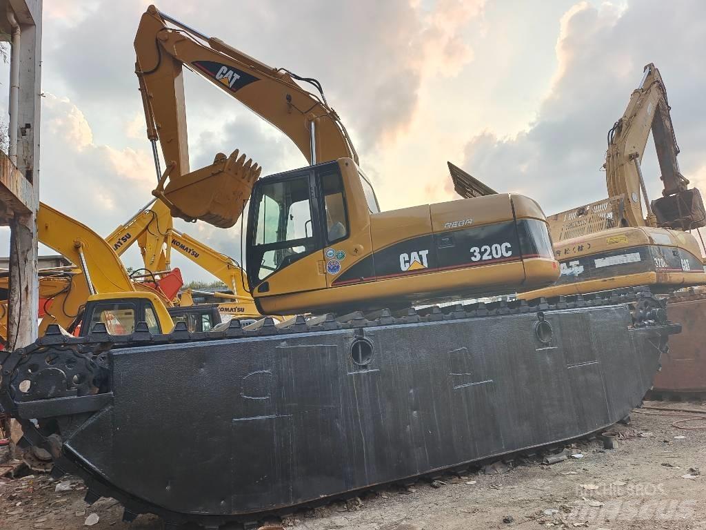CAT 320 C Багери амфибии