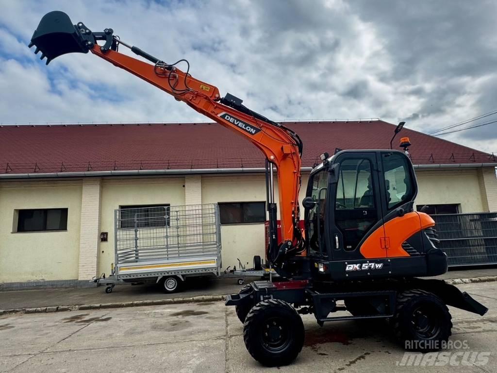 Develon DX 57 W-7 Колесни екскаватори