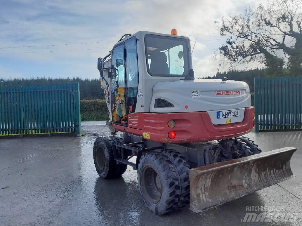 Takeuchi TB 295 W Колесни екскаватори